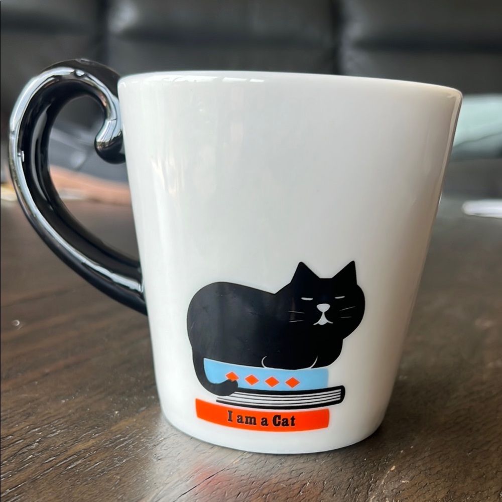 Concombre Minimalist Black and White Cat Mug with Silhouette Design